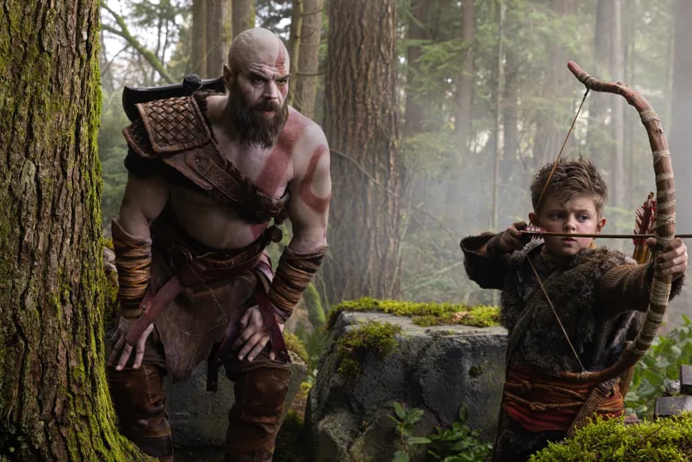 Promo shot of Amazon Prime Video's God of War, featuring Ryan Hurst as Kratos and Callum Vinson as Atreus.